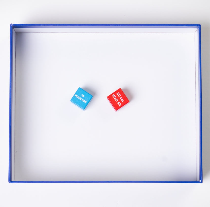 Two ROLKAH fitness dice inside the box lid